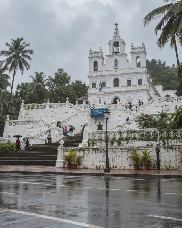 The white Immaculate Conception Church and its zigzag stairway in Panaji, Goa
